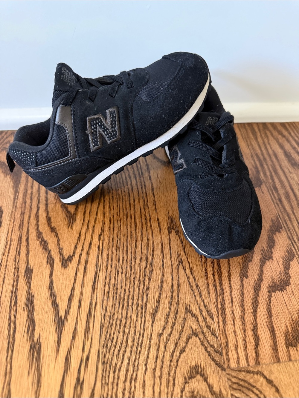 New Balance 574 Kids Black with Metallic Sneakers